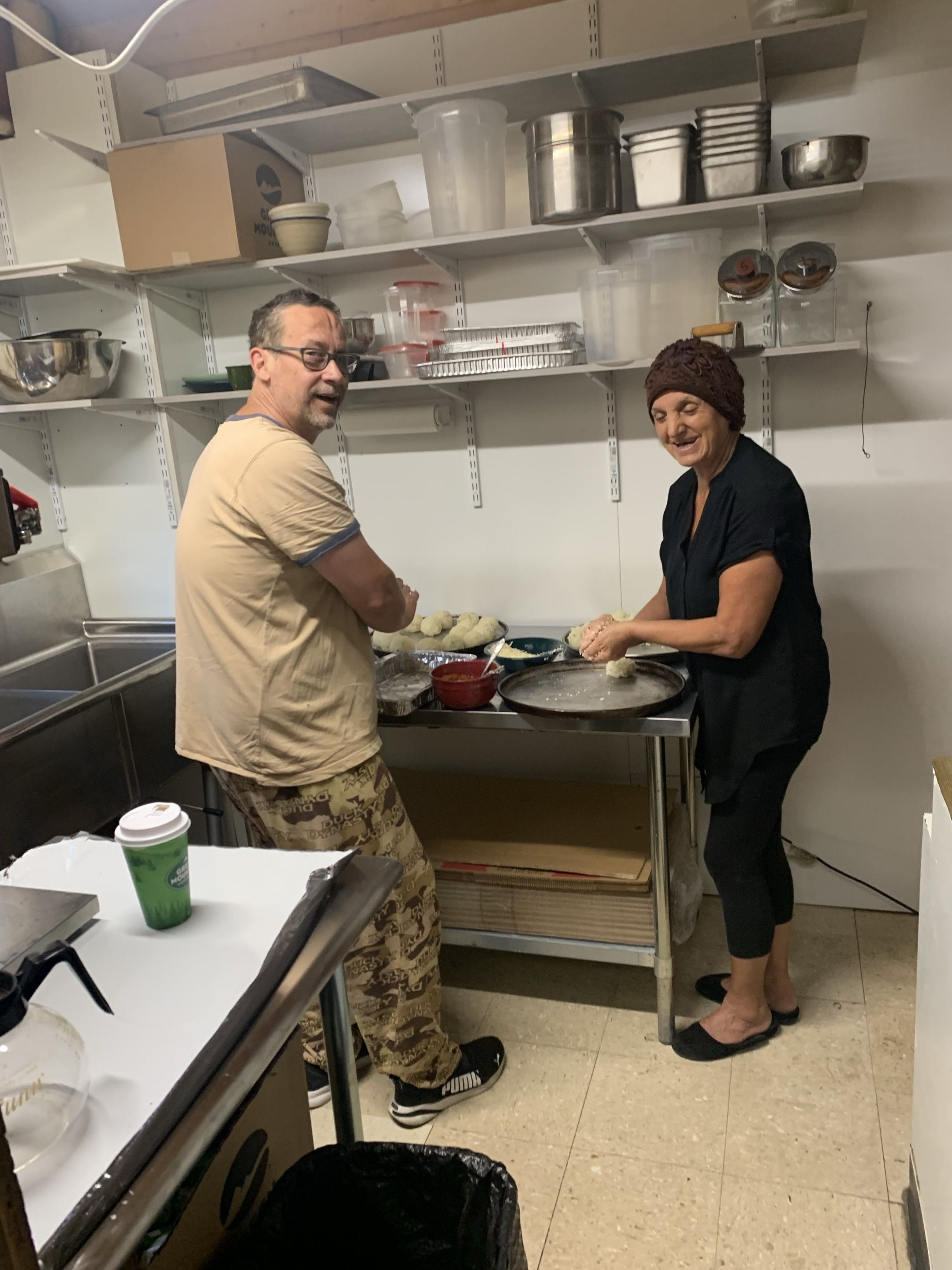 Phil and Nonna working together in the Way Station kitchen